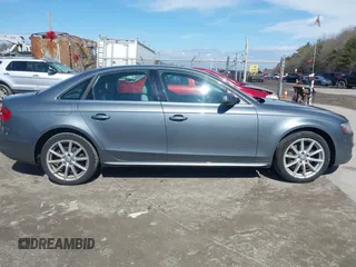 2014 Audi A4 Premium Plus z VIN WAUFFAFL6EN017277, wystawiony jako IAAI lot #41878643 z przebiegiem 105 100 mil mil oraz . Historia ofert i sprzedaży dostępna na DreamBid. Obrazek 13.