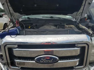 2011 Ford F-250 XL with VIN 1FT7X2B66BEC41526, listed as a Copart auction lot 63617455 with 197,068 mi miles and Salvage title. Bid and sale history available at DreamBid. Image 11.