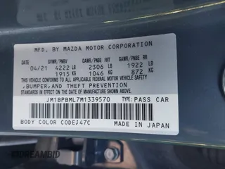2021 Mazda 3 Premium with VIN JM1BPBML7M1339570, listed as a IAAI auction lot 41394510 with 47,395 mi miles and . Bid and sale history available at DreamBid. Image 9.