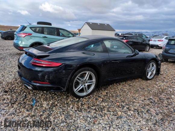 2017 Porsche 911 Carrera with VIN WP0AA2A96HS107967, listed as a Copart auction lot 48043775 with 57,235 mi miles and Salvage Title. Bid and sale history available at carsss.com. Image 3.