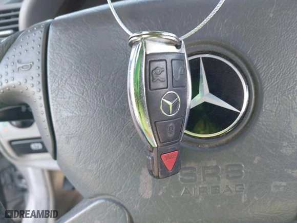 1999 Mercedes-Benz CLK-Class with VIN WDBLK65G6XT006151, listed as a IAAI auction lot 41597025 with 230,751 mi miles. Bid and sale history available at carsss.com. Image 11.