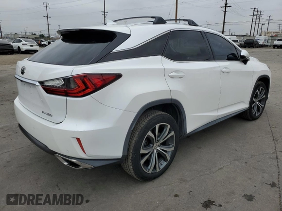 2016 Lexus RX 350 with VIN 2T2ZZMCA0GC024433, listed as a Copart auction lot 59923845 with 69,552 mi miles and Salvage title. Bid and sale history available at DreamBid. Image 3.