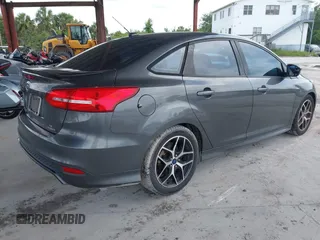 2015 Ford Focus SE with VIN 1FADP3F23FL247162, listed as a IAAI auction lot 42542583 with 95,852 mi miles and . Bid and sale history available at DreamBid. Image 4.