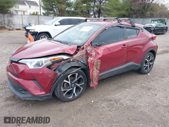 2018 Toyota C-HR XLE z VIN NMTKHMBX7JR005504, wystawiony jako IAAI lot #41806239 z przebiegiem 114 475 mil mil oraz . Historia ofert i sprzedaży dostępna na DreamBid. Obrazek 2.