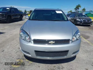 2014 Chevrolet Impala LT with VIN 2G1WB5E34E1178129, listed as a IAAI auction lot 42602823 with 132,713 mi miles and . Bid and sale history available at DreamBid. Image 6.