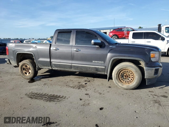 2014 GMC Sierra 1500 SLT with VIN 1GTV2VEJ1EZ330022, listed as a Copart auction lot 77237594 with 121,520 mi miles and Salvage Title. Bid and sale history available at carsss.com. Image 4.