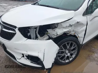 2018 Buick Encore Sport Touring with VIN KL4CJ1SB3JB683195, listed as a IAAI auction lot 41672834 with 19,037 mi miles. Bid and sale history available at carsss.com. Image 6.
