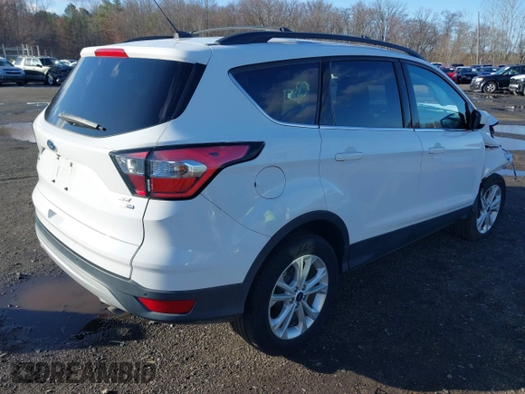 2017 Ford Escape SE with VIN 1FMCU9GD5HUE00425, listed as a IAAI auction lot 41843115 with 64,896 mi miles. Bid and sale history available at carsss.com. Image 4.