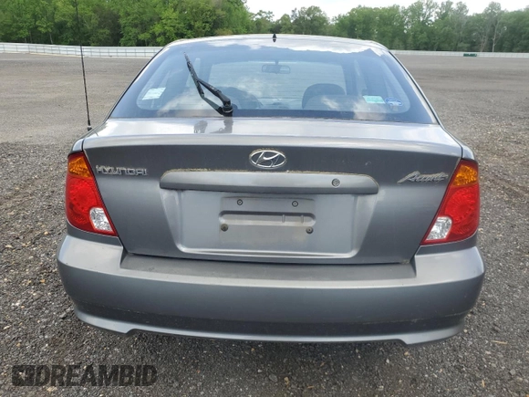 2005 Hyundai Accent GLS with VIN KMHCG35C15U342811, listed as a Copart auction lot 54855705 with 39,299 mi miles and Clean Title. Bid and sale history available at carsss.com. Image 6.