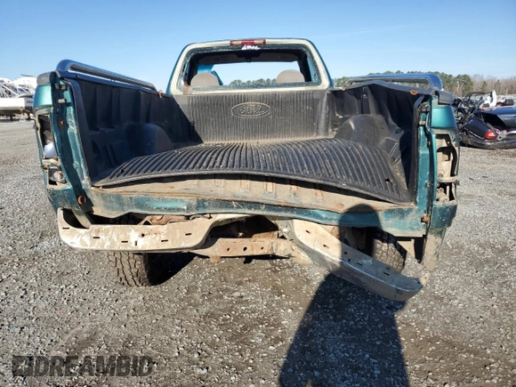1998 Ford F-150 with VIN 1FTZF18W1WNA35212, listed as a Copart auction lot 45361785 with 227,735 mi miles and Salvage title. Bid and sale history available at DreamBid. Image 6.