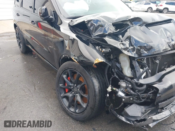 2023 Dodge Durango SRT Hellcat Premium with VIN 1C4SDJH90PC557375, listed as a IAAI auction lot 41328850 with 30,697 mi miles and . Bid and sale history available at DreamBid. Image 17.
