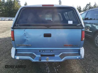 1996 GMC Sonoma SLS with VIN 1GTCS1947T8515229, listed as a Copart auction lot 81010404 with 0 mi miles and Salvage Title. Bid and sale history available at carsss.com. Image 6.