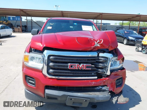 2016 GMC Canyon 2WD z VIN 1GTH5BEA8G1367539, wystawiony jako IAAI lot #41984288 z przebiegiem 111 878 mil mil oraz . Historia ofert i sprzedaży dostępna na DreamBid. Obrazek 13.
