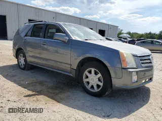 2004 Cadillac SRX z VIN 1GYEE637540179445, wystawiony jako Copart lot #58172235 z przebiegiem 207 598 mil mil oraz Szkody całkowita. Historia ofert i sprzedaży dostępna na DreamBid. Obrazek 4.
