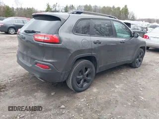 2017 Jeep Cherokee Sport with VIN 1C4PJMAS3HW520964, listed as a IAAI auction lot 42009259 with 170,683 mi miles. Bid and sale history available at carsss.com. Image 4.