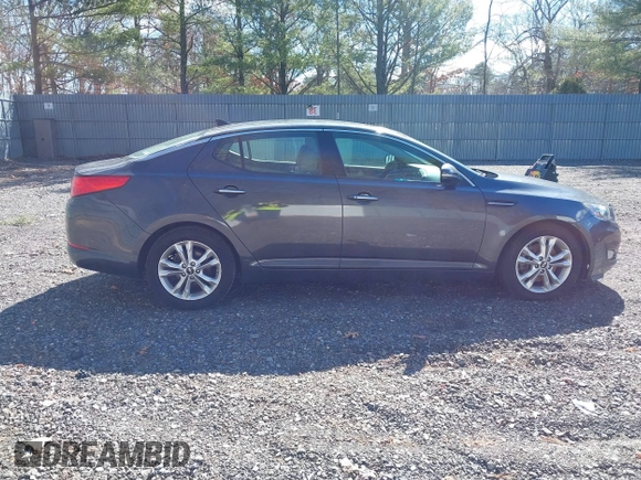 2011 Kia Optima EX with VIN KNAGN4A61B5131919, listed as a IAAI auction lot 41740091 with 102,065 mi miles and . Bid and sale history available at carsss.com. Image 13.
