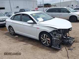 2021 Volkswagen Jetta S z VIN 3VW6T7BU2MM061165, wystawiony jako IAAI lot #42423828 z przebiegiem 41 603 mil mil oraz . Historia ofert i sprzedaży dostępna na DreamBid. Obrazek 1.