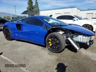 2023 McLaren Artura z VIN SBM16AEA9PW001592, wystawiony jako Copart lot #50613595 z przebiegiem 2956 mil mil oraz Szkody całkowita. Historia ofert i sprzedaży dostępna na DreamBid. Obrazek 4.