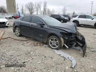 2016 Ford Fusion Titanium Hybrid z VIN 3FA6P0RU6GR139495, wystawiony jako Copart lot #52381235 z przebiegiem 138 534 mil mil oraz Czysty tytuł • Clean title. Historia ofert i sprzedaży dostępna na DreamBid. Obrazek 4.