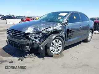 2015 Volkswagen Jetta SE with VIN 3VWD17AJ6FM406091, listed as a IAAI auction lot 42539626 with 82,005 mi miles and . Bid and sale history available at DreamBid. Image 2.