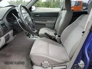 2003 Subaru Forester XS with VIN JF1SG656X3H700009, listed as a Copart auction lot 71077514 with 249,471 mi miles and Salvage Title. Bid and sale history available at carsss.com. Image 7.