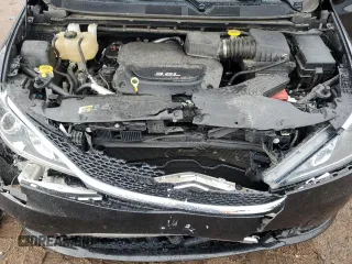 2017 Chrysler Pacifica Touring L z VIN 2C4RC1BG0HR780064, wystawiony jako Copart lot #56213165 z przebiegiem 64 768 mil mil oraz Szkoda całkowita • Salvage title. Historia ofert i sprzedaży dostępna na DreamBid. Obrazek 12.