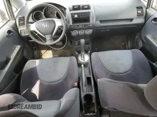 2007 Honda Fit z VIN JHMGD38427S021652, wystawiony jako Copart lot #52692775 z przebiegiem 178 416 mil mil oraz Szkoda całkowita • Salvage title. Historia ofert i sprzedaży dostępna na DreamBid. Obrazek 8.