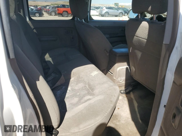 2004 Nissan Frontier XE z VIN 1N6ED27T04C479222, wystawiony jako Copart lot #50957035 z przebiegiem 198 723 mil mil oraz Czysty tytuł • Clean title. Historia ofert i sprzedaży dostępna na DreamBid. Obrazek 10.