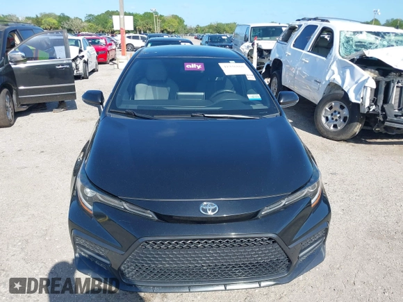 2021 Toyota Corolla SE with VIN JTDS4MCE5MJ056494, listed as a IAAI auction lot 41936866 with 128,257 mi miles. Bid and sale history available at carsss.com. Image 12.