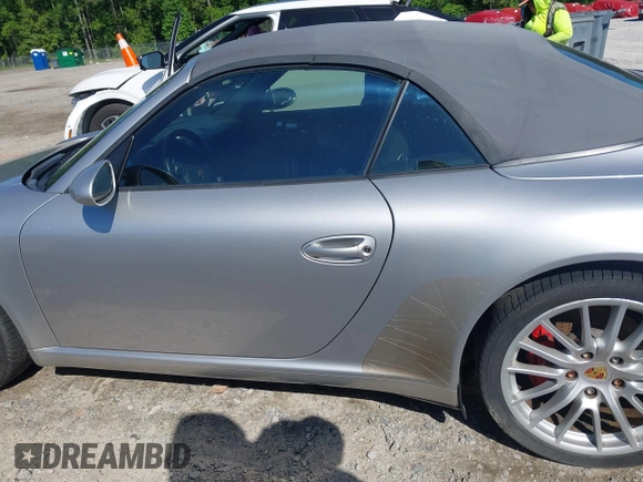 2006 Porsche 911 Carrera S z VIN WP0CB29976S766616, wystawiony jako IAAI lot #42119525 z przebiegiem 57 164 mil mil oraz . Historia ofert i sprzedaży dostępna na DreamBid. Obrazek 14.