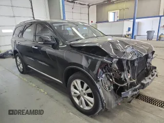 2013 Dodge Durango Crew z VIN 1C4RDJDGXDC672239, wystawiony jako Copart lot #59227905 z przebiegiem 167 982 mil mil oraz Szkoda całkowita • Salvage title. Historia ofert i sprzedaży dostępna na DreamBid. Obrazek 4.