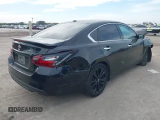 2018 Nissan Altima 2.5 SR with VIN 1N4AL3AP3JC298848, listed as a IAAI auction lot 40966335 with 121,163 mi miles. Bid and sale history available at carsss.com. Image 4.