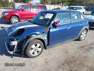 2016 MINI Hardtop 4 Door z VIN WMWXU1C54G2D09582, wystawiony jako IAAI lot #41754947 z przebiegiem 113 405 mil mil oraz . Historia ofert i sprzedaży dostępna na DreamBid. Obrazek 2.