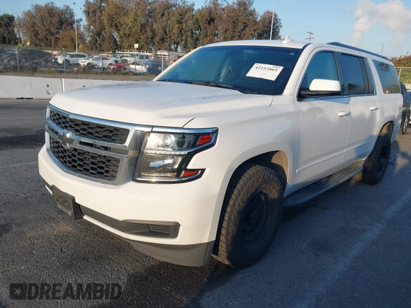 2018 Chevrolet Suburban LS with VIN 1GNSKGKC5JR173889, listed as a IAAI auction lot 42152865 with 73,358 mi miles and . Bid and sale history available at DreamBid. Image 2.