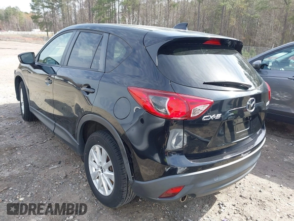 2014 Mazda CX-5 Touring with VIN JM3KE2CY9E0333951, listed as a IAAI auction lot 41825345 with 124,684 mi miles. Bid and sale history available at carsss.com. Image 3.