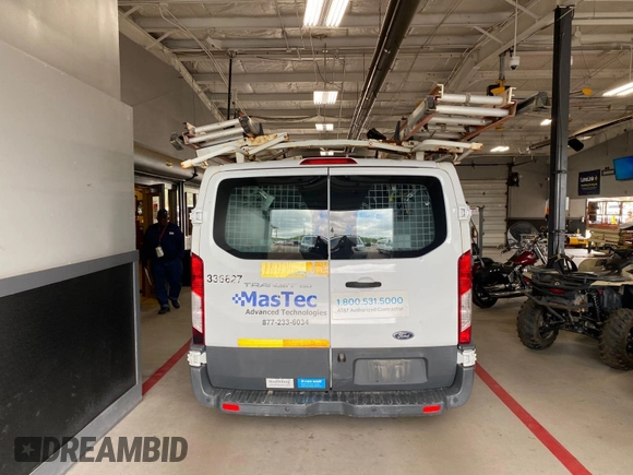 2016 Ford Transit Cargo with VIN 1FTYE1YM4GKB52041, listed as a IAAI auction lot 42284153 with 177,079 mi miles and . Bid and sale history available at DreamBid. Image 7.