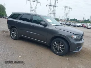 2014 Dodge Durango SXT with VIN 1C4RDJAG0EC562127, listed as a IAAI auction lot 42456152 with 124,171 mi miles and . Bid and sale history available at DreamBid. Image 1.