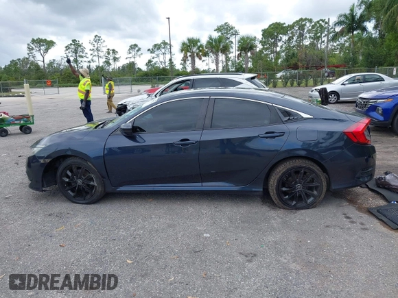 2016 Honda Civic Sedan LX with VIN 19XFC2F52GE069998, listed as a IAAI auction lot 42016233 with 93,990 mi miles. Bid and sale history available at carsss.com. Image 14.
