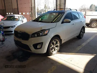 2016 Kia Sorento SX with VIN 5XYPKDA51GG183763, listed as a IAAI auction lot 41513849 with 164,269 mi miles. Bid and sale history available at carsss.com. Image 2.