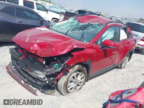 2024 Toyota Corolla Cross LE with VIN 7MUCAAAGXRV087580, listed as a IAAI auction lot 42067635 with 5,699 mi miles and . Bid and sale history available at DreamBid. Image 2.