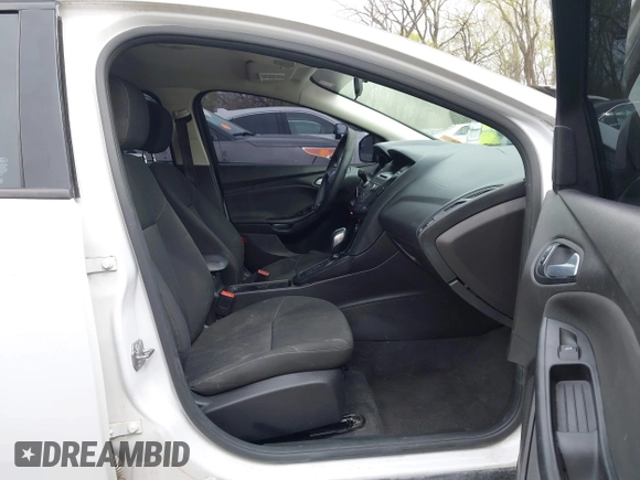 2016 Ford Focus SE with VIN 1FADP3F2XGL324613, listed as a IAAI auction lot 41971597 with 126,738 mi miles. Bid and sale history available at carsss.com. Image 5.