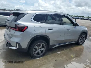 2024 BMW X1 xDrive28i with VIN WBX73EF07R5007427, listed as a Copart auction lot 64377815 with 25,783 mi miles and Clean title. Bid and sale history available at DreamBid. Image 3.