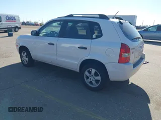 2006 Hyundai Tucson GL with VIN KM8JM72B56U324168, listed as a IAAI auction lot 42146955 with 206,919 mi miles. Bid and sale history available at carsss.com. Image 3.