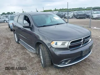 2015 Dodge Durango SXT with VIN 1C4RDJAG6FC938587, listed as a IAAI auction lot 42379822 with 174,644 mi miles and . Bid and sale history available at DreamBid. Image 1.