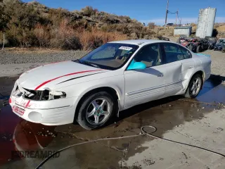 2000 Pontiac Bonneville SE z VIN 1G2HX54K2Y4241848, wystawiony jako Copart lot #80999434 z przebiegiem Nie podano mil oraz Szkody całkowita. Historia ofert i sprzedaży dostępna na DreamBid. Obrazek 1.