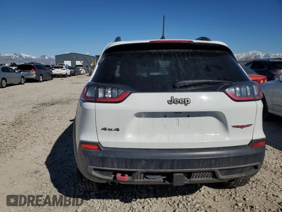 2019 Jeep Cherokee Trailhawk with VIN 1C4PJMBX7KD336494, listed as a Copart auction lot 50346545 with 69,994 mi miles and Salvage Title. Bid and sale history available at DreamBid. Image 6.