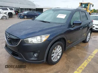 2015 Mazda CX-5 Touring with VIN JM3KE2CY5F0449195, listed as a IAAI auction lot 41894567 with 124,694 mi miles and . Bid and sale history available at DreamBid. Image 18.
