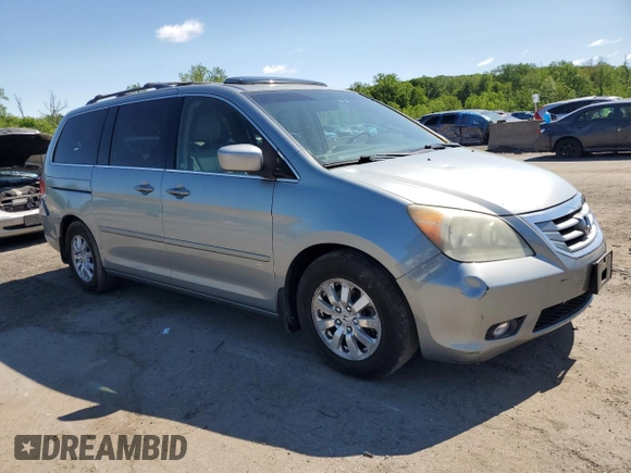 2010 Honda Odyssey EX-L с VIN 5FNRL3H75AB054835, выставлен на аукционе Copart как лот 56779865 с пробегом 121 546 миль миль и Чистый • Clean title. История ставок и продаж доступна на DreamBid. Изображение 4.