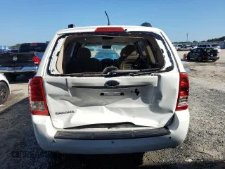 2012 Kia Sedona LX with VIN KNDMG4C74C6427812, listed as a Copart auction lot 71851574 with 89,864 mi miles and Salvage Title. Bid and sale history available at carsss.com. Image 6.