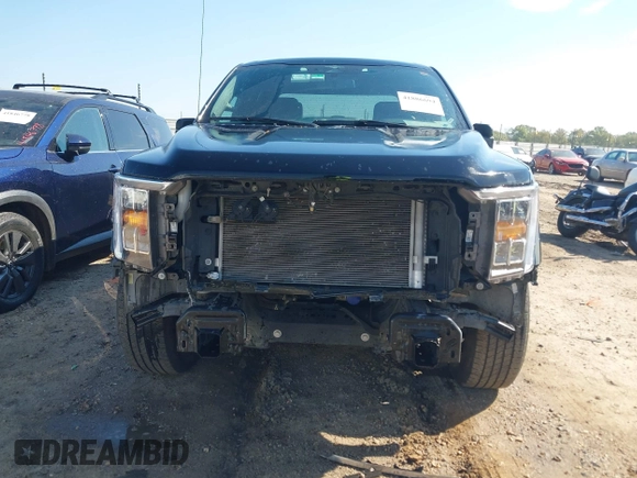 2023 Ford F-150 XL with VIN 1FTEW1C59PFB19609, listed as a IAAI auction lot 41886694 with 61,349 mi miles and . Bid and sale history available at DreamBid. Image 13.